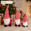 EYB22665 Christmas gnome seasonal tree display
